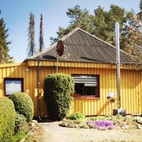 Außenansicht vom gelben Ferienhaus 