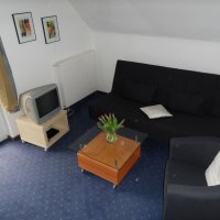 Wohnzimmer Ferienwohnung Bremer