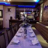 gedeckte Tafel im griechischen Restaurant Olympia